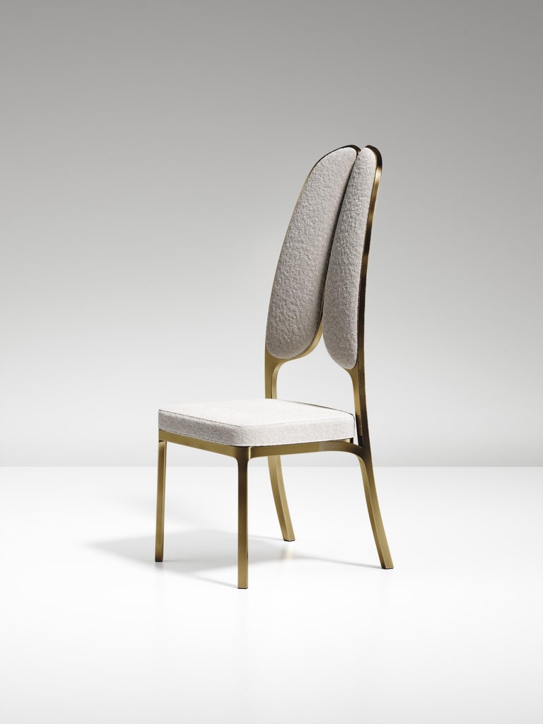 https://a.1stdibscdn.com/upholstered-dining-chair-with-bronze-patina-brass-details-by-ry-augousti-for-sale-picture-8/f_45491/f_320580421672900693930/CH38_PFC_1_master.jpg?width=768