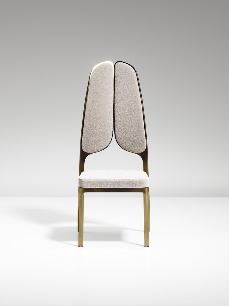 https://a.1stdibscdn.com/upholstered-dining-chair-with-bronze-patina-brass-details-by-ry-augousti-for-sale-picture-9/f_45491/f_320580421672900696468/CH38_PFC_2_master.jpg?width=768