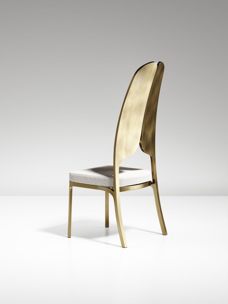 https://a.1stdibscdn.com/upholstered-dining-chair-with-bronze-patina-brass-details-by-ry-augousti-for-sale-picture-10/f_45491/f_320580421672900695730/CH38_PFC_3_master.jpg?width=768