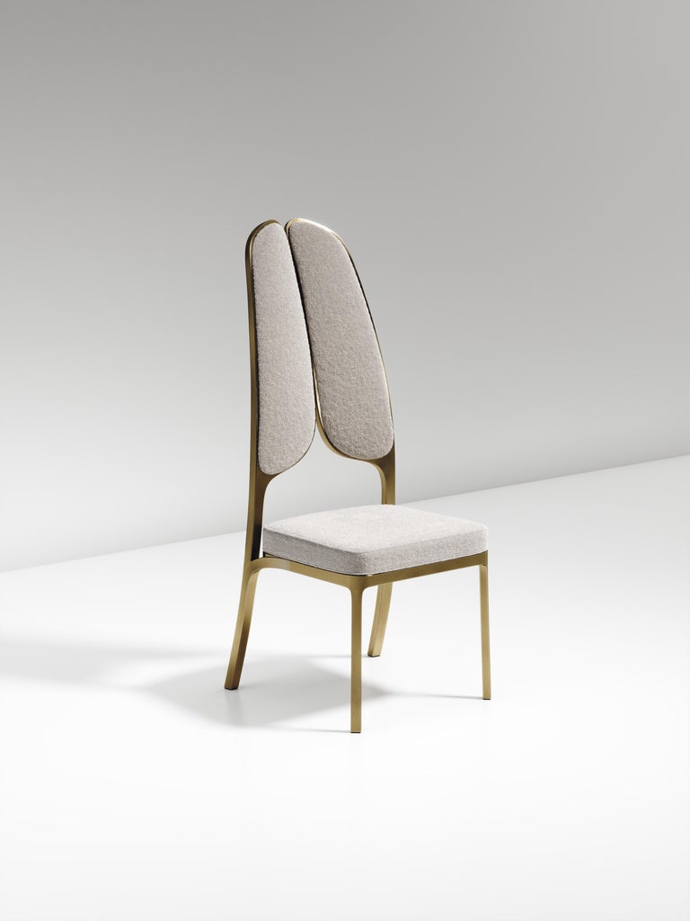 https://a.1stdibscdn.com/upholstered-dining-chair-with-bronze-patina-brass-details-by-ry-augousti-for-sale-picture-11/f_45491/f_320580421672900696103/CH38_PFC_4_master.jpg?width=768