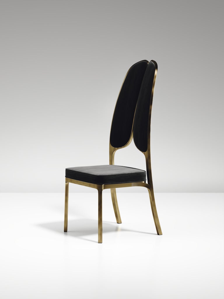 https://a.1stdibscdn.com/upholstered-dining-chair-with-bronze-patina-brass-details-by-ry-augousti-for-sale-picture-15/f_45491/f_320580421672900870500/CH38_VL1_1_master.jpg?width=768