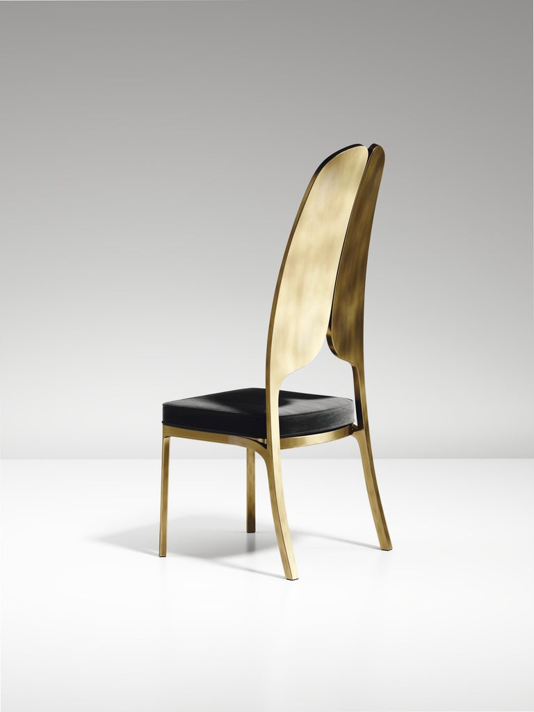 https://a.1stdibscdn.com/upholstered-dining-chair-with-bronze-patina-brass-details-by-ry-augousti-for-sale-picture-16/f_45491/f_320580421672900895398/CH38_VL1_3_master.jpg?width=768