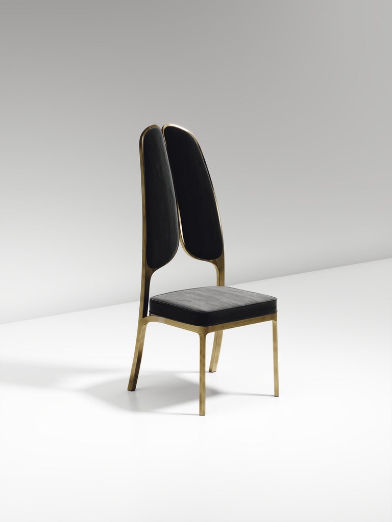 https://a.1stdibscdn.com/upholstered-dining-chair-with-bronze-patina-brass-details-by-ry-augousti-for-sale-picture-17/f_45491/f_320580421672900929810/CH38_VL1_4_master.jpg?width=768