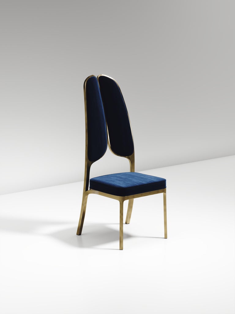 https://a.1stdibscdn.com/upholstered-dining-chair-with-bronze-patina-brass-details-by-ry-augousti-for-sale-picture-2/f_45491/f_320580421672900640476/CH38_VL3_4_master.jpg?width=768