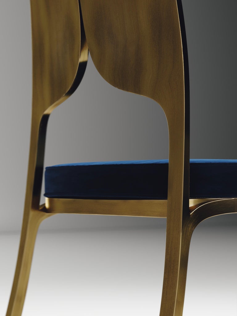 https://a.1stdibscdn.com/upholstered-dining-chair-with-bronze-patina-brass-details-by-ry-augousti-for-sale-picture-6/f_45491/f_320580421672900649955/CH38_VL3_9_master.jpg?width=768