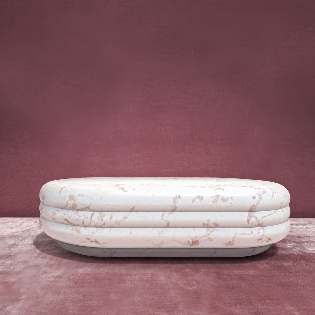 https://a.1stdibscdn.com/chloe-curvy-oval-coffee-table-in-sculpted-pink-portugal-marble-for-sale-picture-2/f_22063/f_273279521644586901929/CHLOEpp_amb_master.jpg