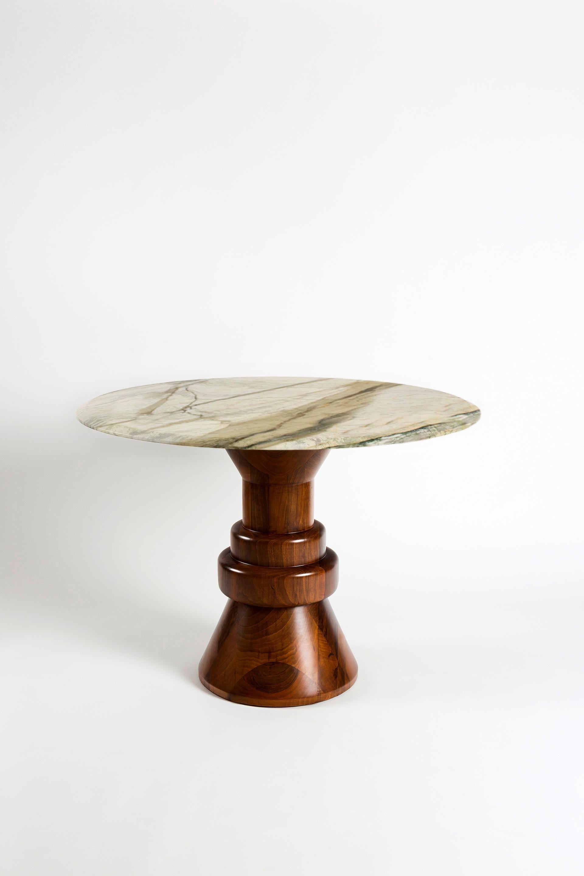 https://a.1stdibscdn.com/21st-century-cream-marble-round-dining-table-with-sculptural-black-wooden-base-for-sale-picture-10/f_36601/f_216813621607120430006/CREAM_2_master.jpg