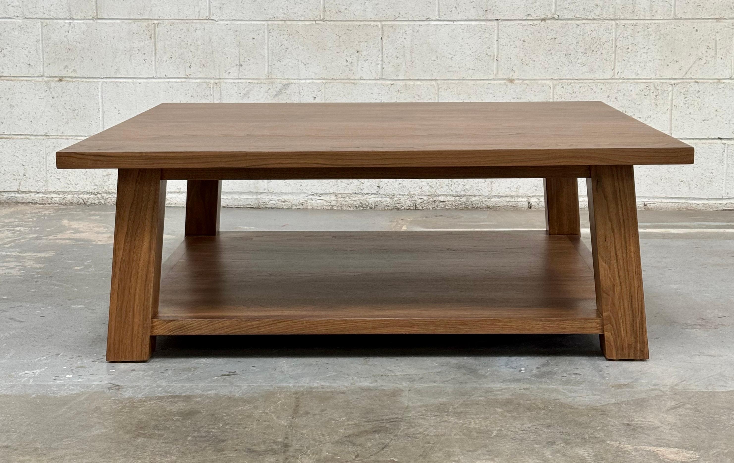 https://a.1stdibscdn.com/custom-klara-coffee-table-in-walnut-by-petersen-antiques-for-sale-picture-2/f_8065/f_432685821737485281587/CR_1_master.jpg