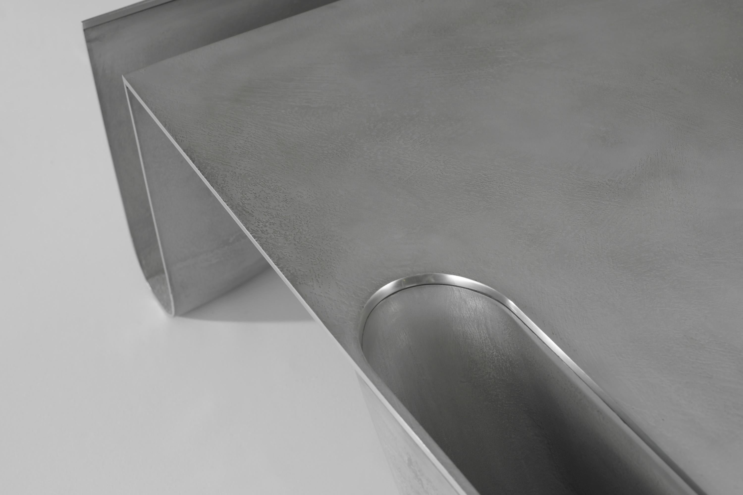 https://a.1stdibscdn.com/aluminium-cast-grey-architectural-bb-coffee-table-for-sale-picture-4/f_70152/f_425407221733053309244/CS_bb_coffeetable3_master.jpg