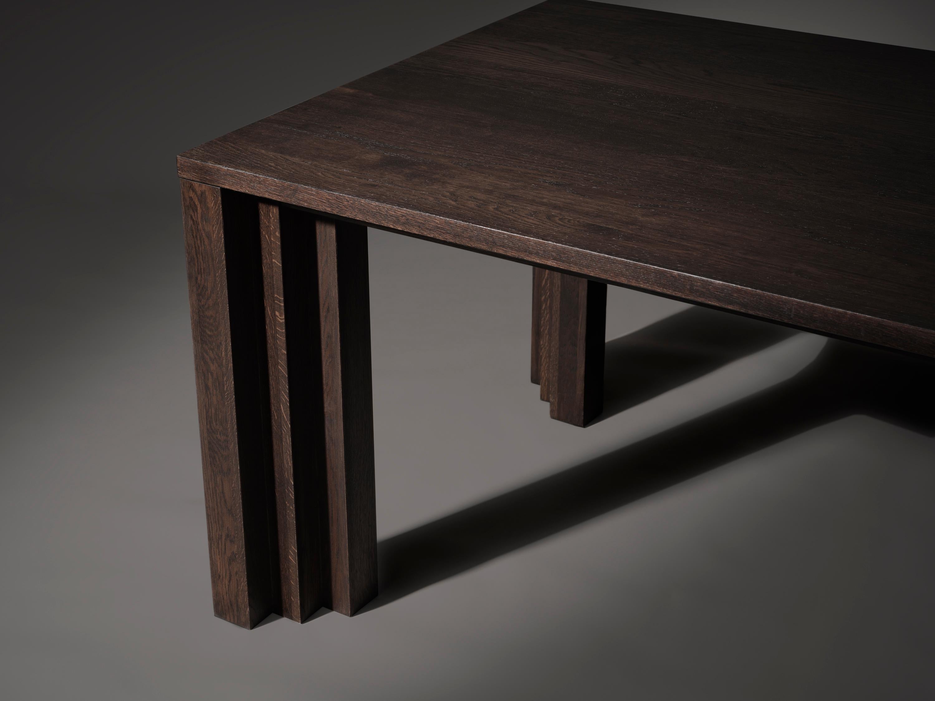 https://a.1stdibscdn.com/cadence-240-dining-room-table-in-dark-brown-european-oak-by-mokko-amsterdam-for-sale-picture-3/f_12192/f_460750021753883689968/Cadence_Table_Dark_Brown_Oak_Detail_two_legs_photo_by_Thomas_van_Schaik_master.jpg