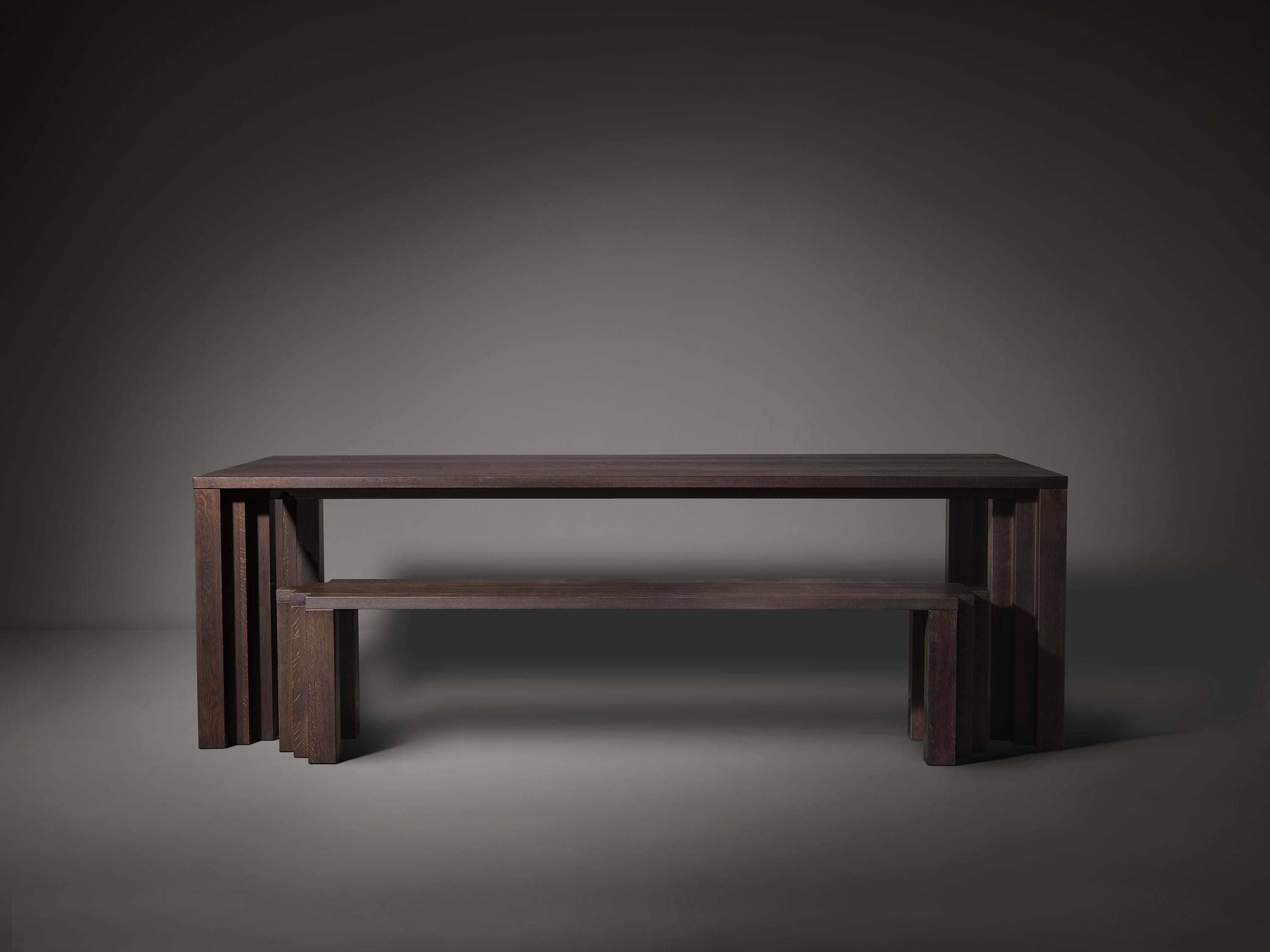https://a.1stdibscdn.com/cadence-240-dining-room-table-in-dark-brown-european-oak-by-mokko-amsterdam-for-sale-picture-4/f_12192/f_460750021753883689624/Cadence_Table_and_Bench_Dark_Brown_Oak_Front_View_photo_by_Thomas_van_Schaik_master.jpg