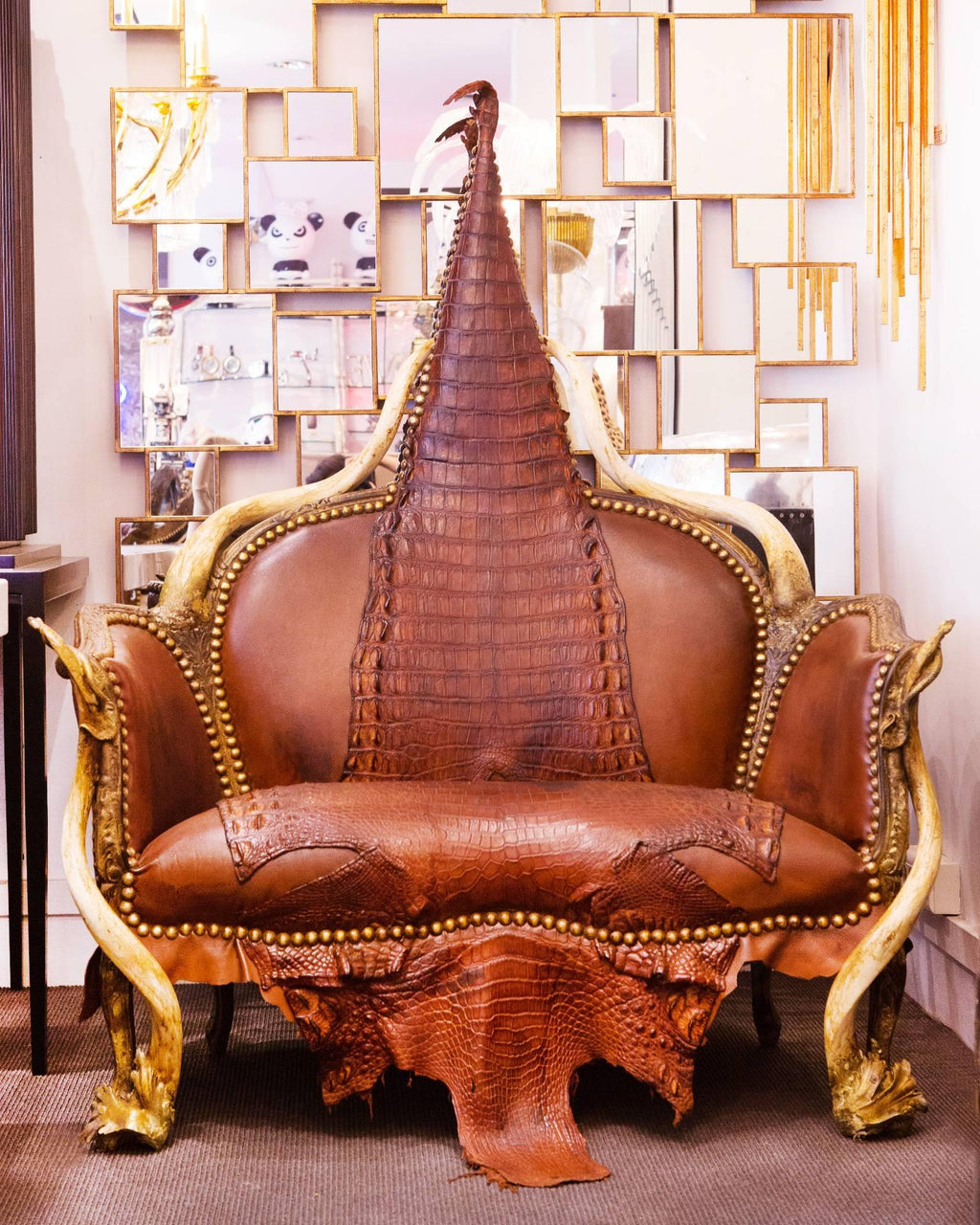 https://a.1stdibscdn.com/crocodile-brown-sofa-with-real-nile-crocodile-skin-and-natural-horns-for-sale-picture-2/f_14282/1528460449661/Canap_7106_master.jpg