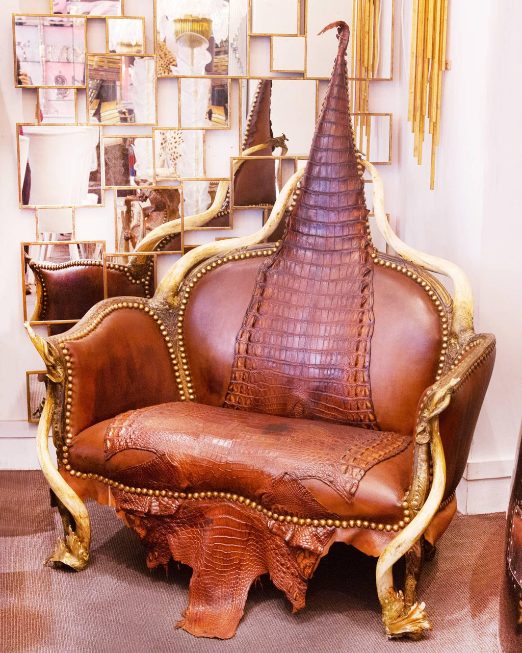 https://a.1stdibscdn.com/crocodile-brown-sofa-with-real-nile-crocodile-skin-and-natural-horns-for-sale-picture-3/f_14282/1528460478314/Canap_7112_master.jpg