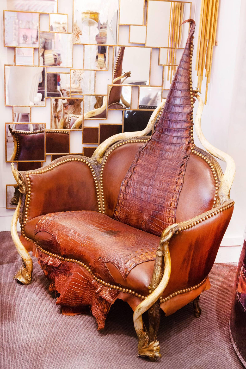 https://a.1stdibscdn.com/crocodile-brown-sofa-with-real-nile-crocodile-skin-and-natural-horns-for-sale-picture-4/f_14282/1528460463408/Canap_7114_master.jpg