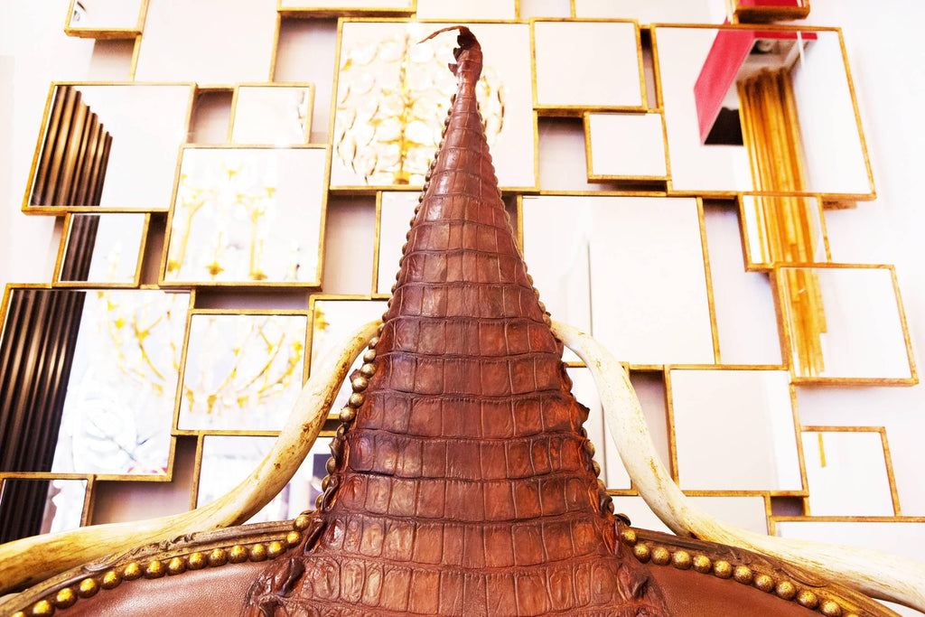 https://a.1stdibscdn.com/crocodile-brown-sofa-with-real-nile-crocodile-skin-and-natural-horns-for-sale-picture-5/f_14282/1528460470148/Canap_7158_master.jpg