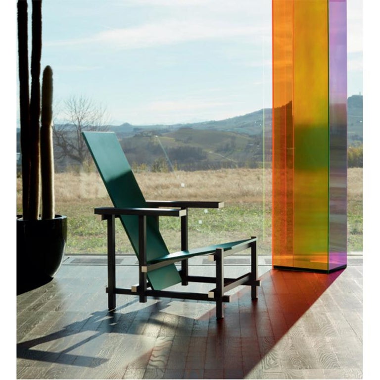 https://a.1stdibscdn.com/gerrit-rietveld-zeilmaker-version-of-black-red-and-blue-chair-by-cassina-for-sale-picture-6/f_14272/f_322677321673951448175/Captura_de_pantalla_2021_03_19_a_las_18_14_00_master.jpg?width=768