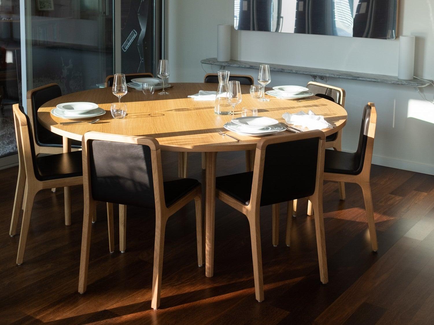 https://a.1stdibscdn.com/minimalist-modern-table-in-oak-wood-round-160cm-for-sale-picture-3/f_60192/f_270098421642775925985/CastTable_09_v1_master.jpg