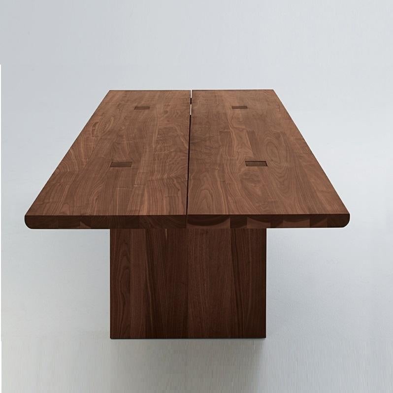 https://a.1stdibscdn.com/contemporary-and-minimalist-table-handcrafted-with-american-walnut-for-sale-picture-2/f_27693/f_434692521738655736413/Celerina_Riva_1920_Arredamenti_Martinel_1711722997_1_2560_master.jpg