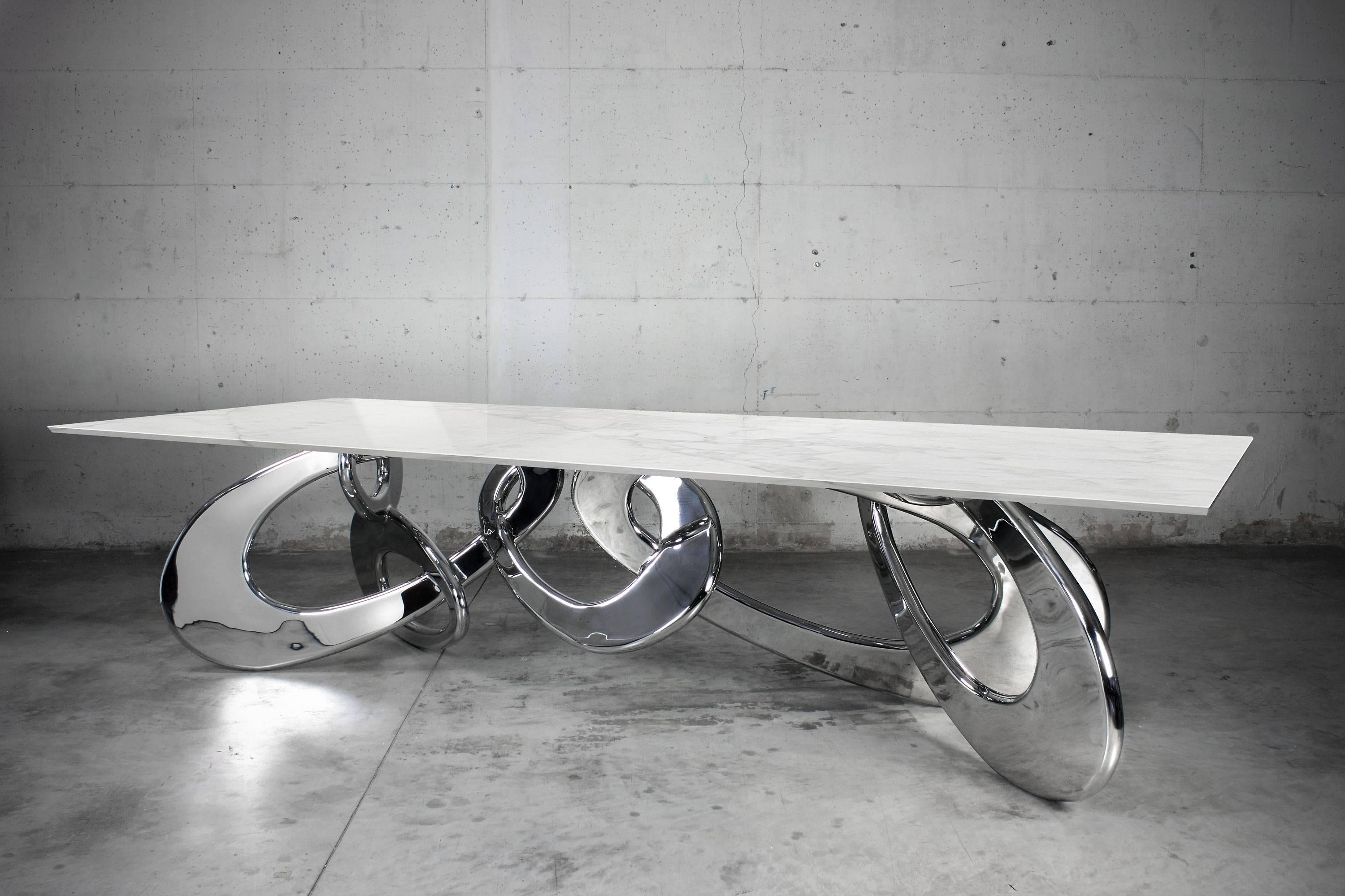 https://a.1stdibscdn.com/dining-table-rings-mirror-steel-base-sculpture-top-blue-onyx-marble-made-italy-for-sale-picture-3/f_22003/f_321506121673364232129/Chained_Up_Miami_barberini_and_gunnell_1_master.jpg