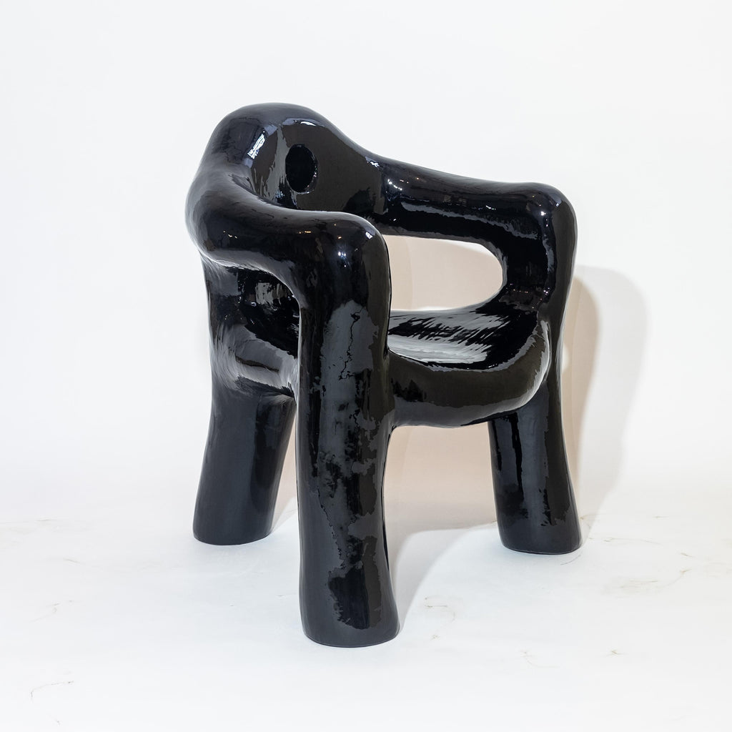 https://a.1stdibscdn.com/black-sculptural-three-legged-armchair-in-resin-covered-foam-by-michal-cihlar-for-sale-picture-2/f_37133/f_259463521635864322187/Chair_1_master.jpg