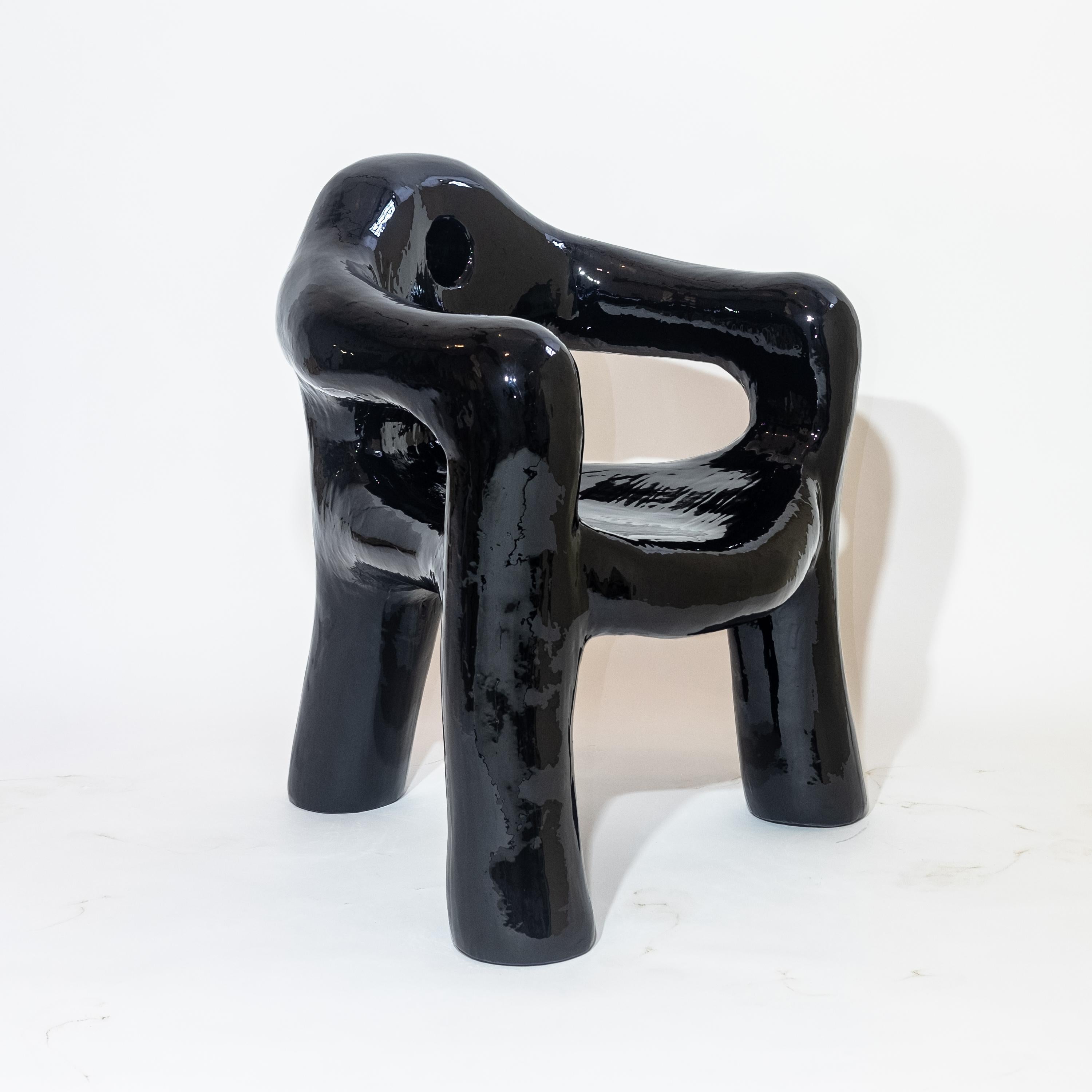 https://a.1stdibscdn.com/black-sculptural-three-legged-armchair-in-resin-covered-foam-by-michal-cihlar-for-sale-picture-2/f_37133/f_259463521635864322187/Chair_1_master.jpg