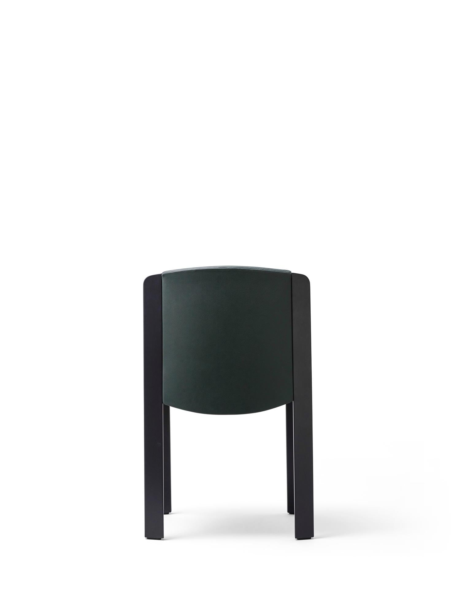 https://a.1stdibscdn.com/set-of-four-joe-colombo-chair-300-wood-and-srensen-leather-by-karakter-for-sale-picture-5/f_14272/f_378351821704704362521/Chair_300_Black_w_Green_Leather_Back_Pack_01_master.jpg