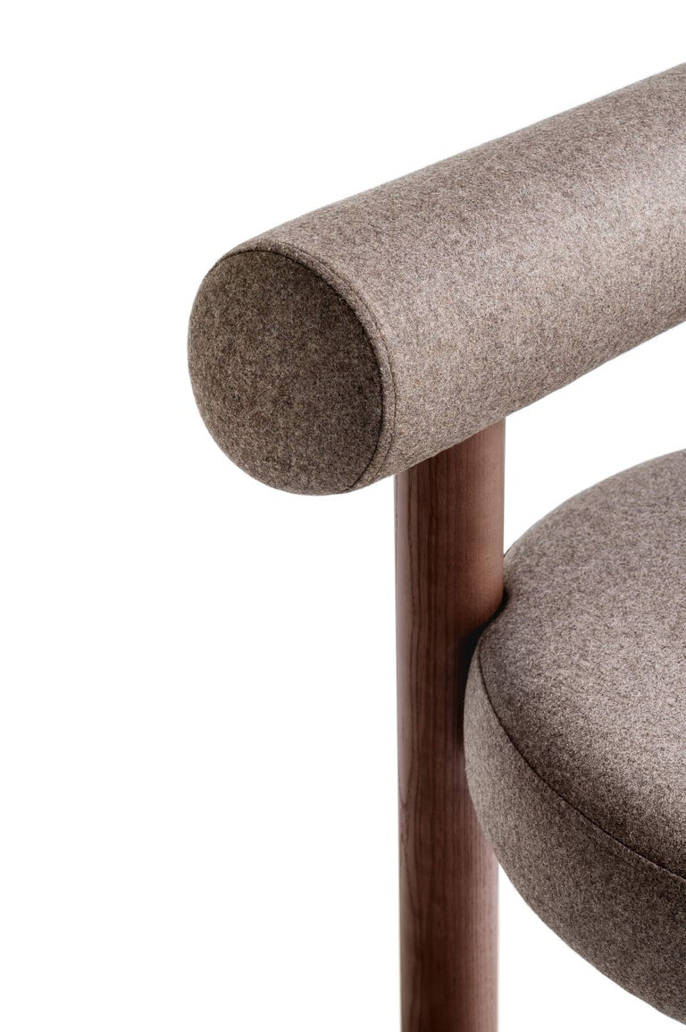 https://a.1stdibscdn.com/modern-chair-gropius-cs2-in-wool-fabric-with-wooden-legs-by-noom-for-sale-picture-13/f_42321/f_178154821623597914341/Chair_Gropius_CS2_by_NOOM_12__master.jpg?width=768