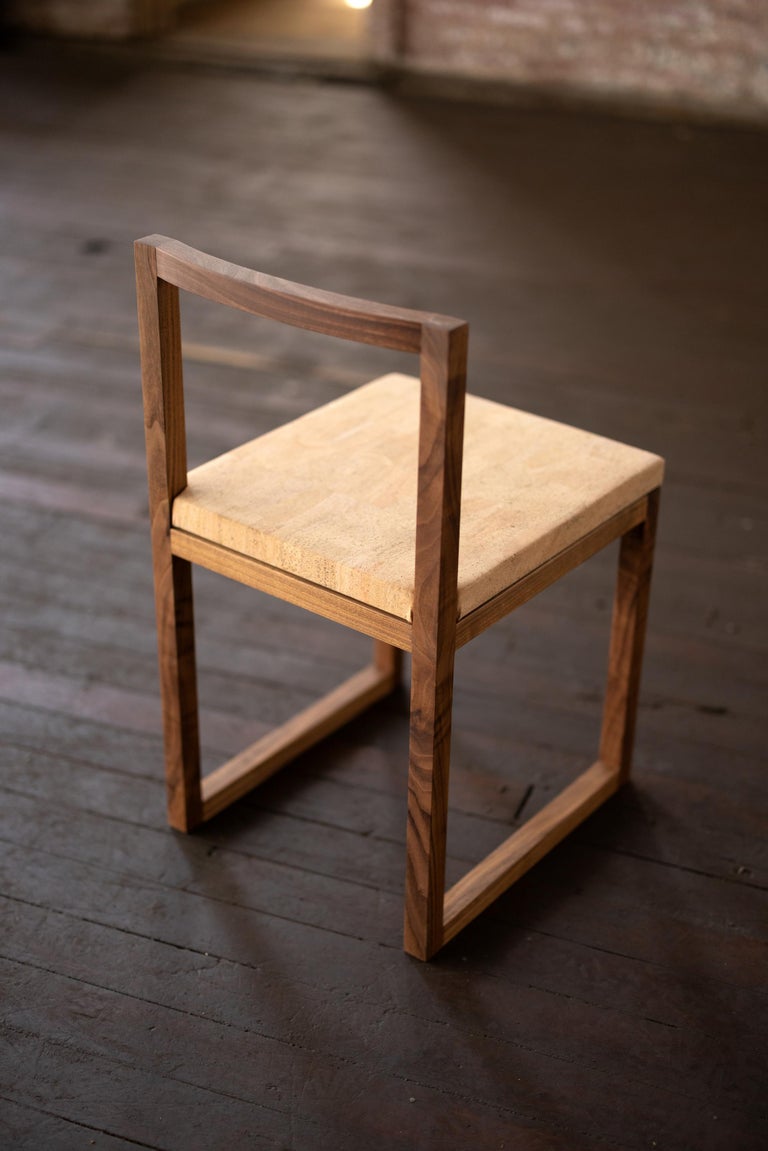 https://a.1stdibscdn.com/walnut-wood-and-cork-chair-dining-or-writing-desk-chair-porto-chair-for-sale-picture-3/f_43982/f_343254721684341677215/Chair_cork_walnut_0306_3000px_master.jpg?width=768