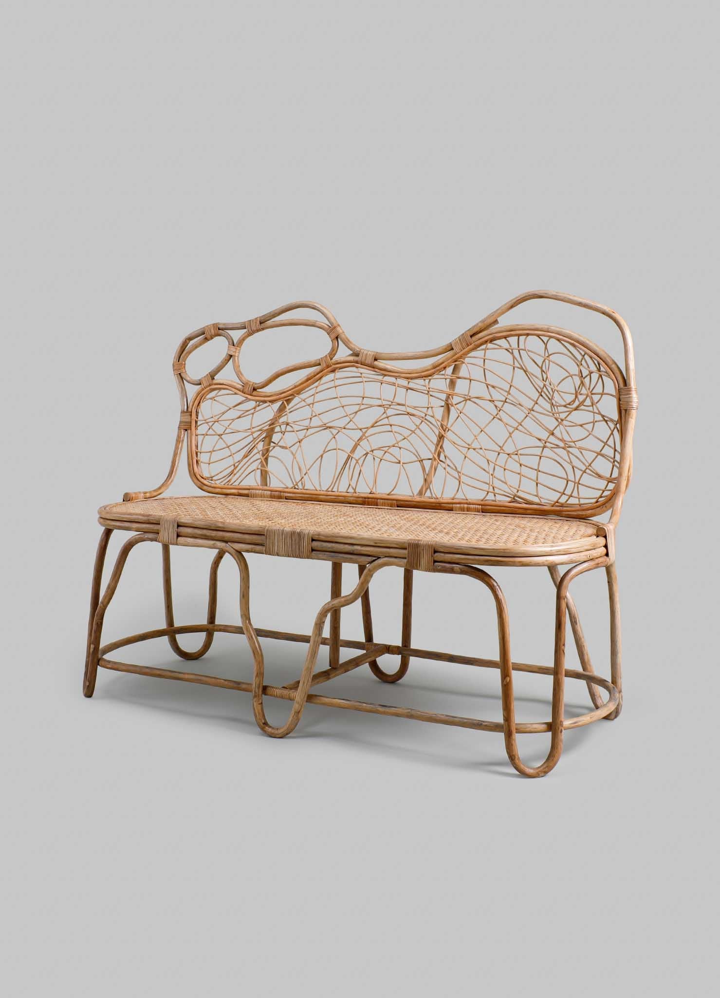 https://a.1stdibscdn.com/chakra-sofa-small-in-cane-viya-by-vikram-goyal-for-sale/f_89622/f_422059621757333448716/Chakra_Sofa_Small_01_org.jpg
