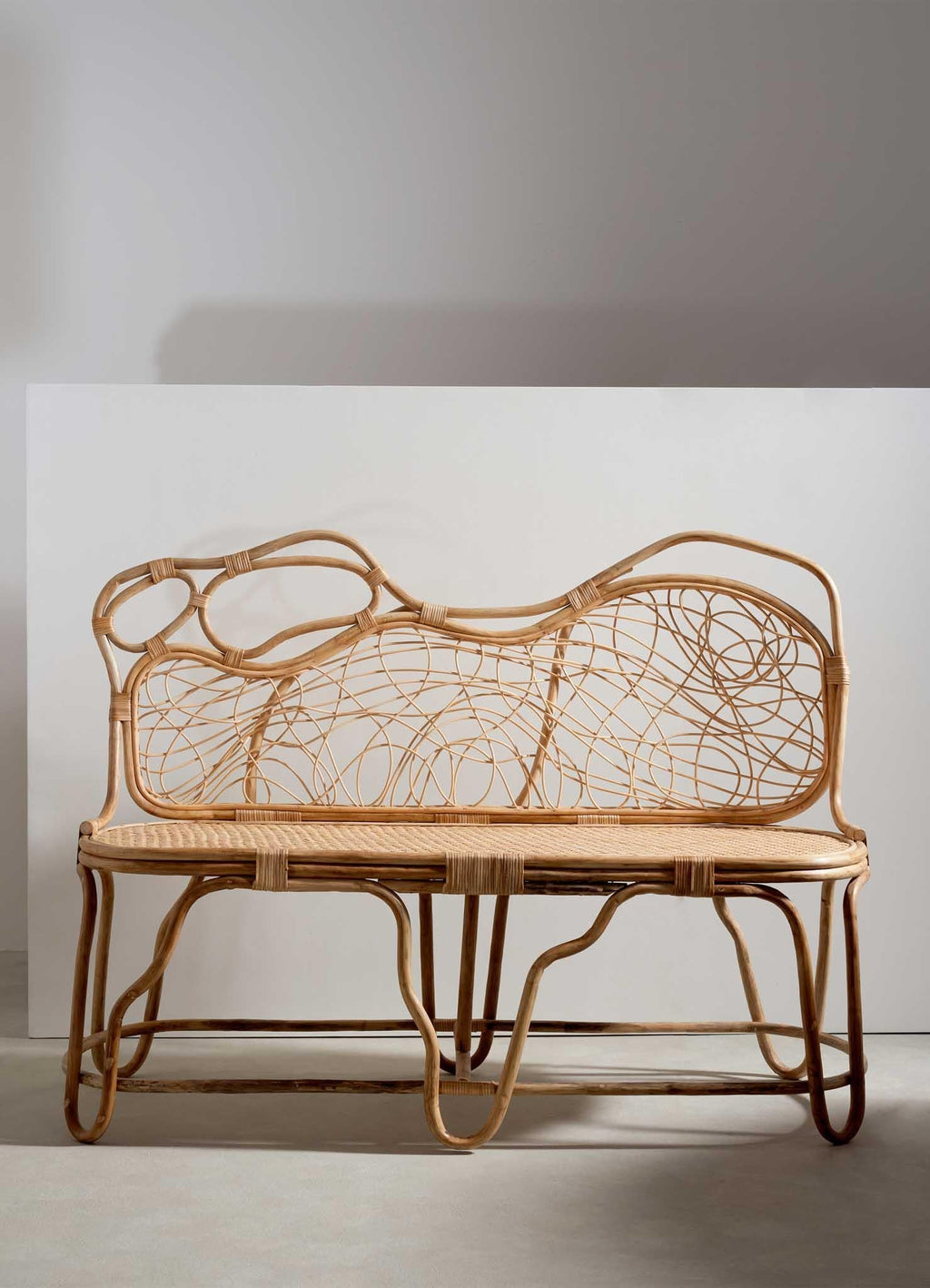 https://a.1stdibscdn.com/chakra-sofa-small-in-cane-viya-by-vikram-goyal-for-sale-picture-8/f_89622/f_422059621757333448602/Chakra_Sofa_Small_02_master.jpg