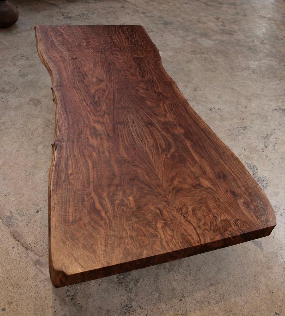 https://a.1stdibscdn.com/claro-walnut-bookmatch-dining-table-in-stock-for-sale-picture-5/f_51472/f_483744221768683126981/ChatGPT_Image_Jan_17_2026_at_01_38_45_PM_master.jpeg