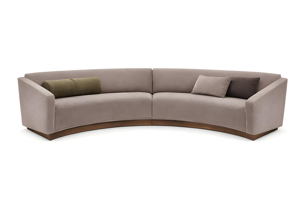 https://a.1stdibscdn.com/olive-curved-sofa-with-tailored-upholstery-and-walnut-plinth-in-matte-finish-for-sale-picture-3/f_27693/f_489275921771729301243/ChatGPT_Image_Jan_28_2026_11_58_58_AM_master.jpg