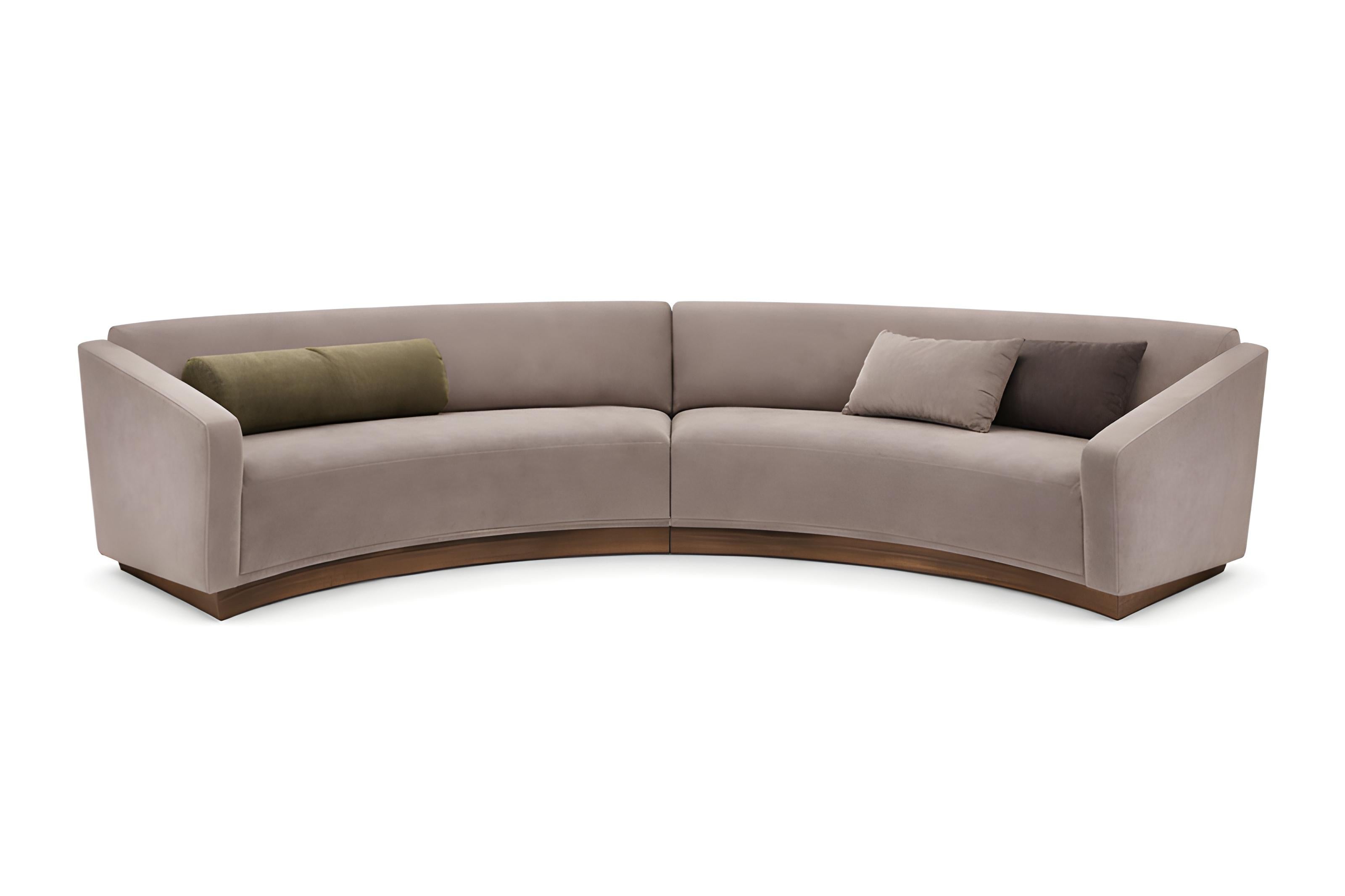 https://a.1stdibscdn.com/olive-curved-sofa-with-tailored-upholstery-and-walnut-plinth-in-matte-finish-for-sale-picture-3/f_27693/f_489275921771729301243/ChatGPT_Image_Jan_28_2026_11_58_58_AM_master.jpg