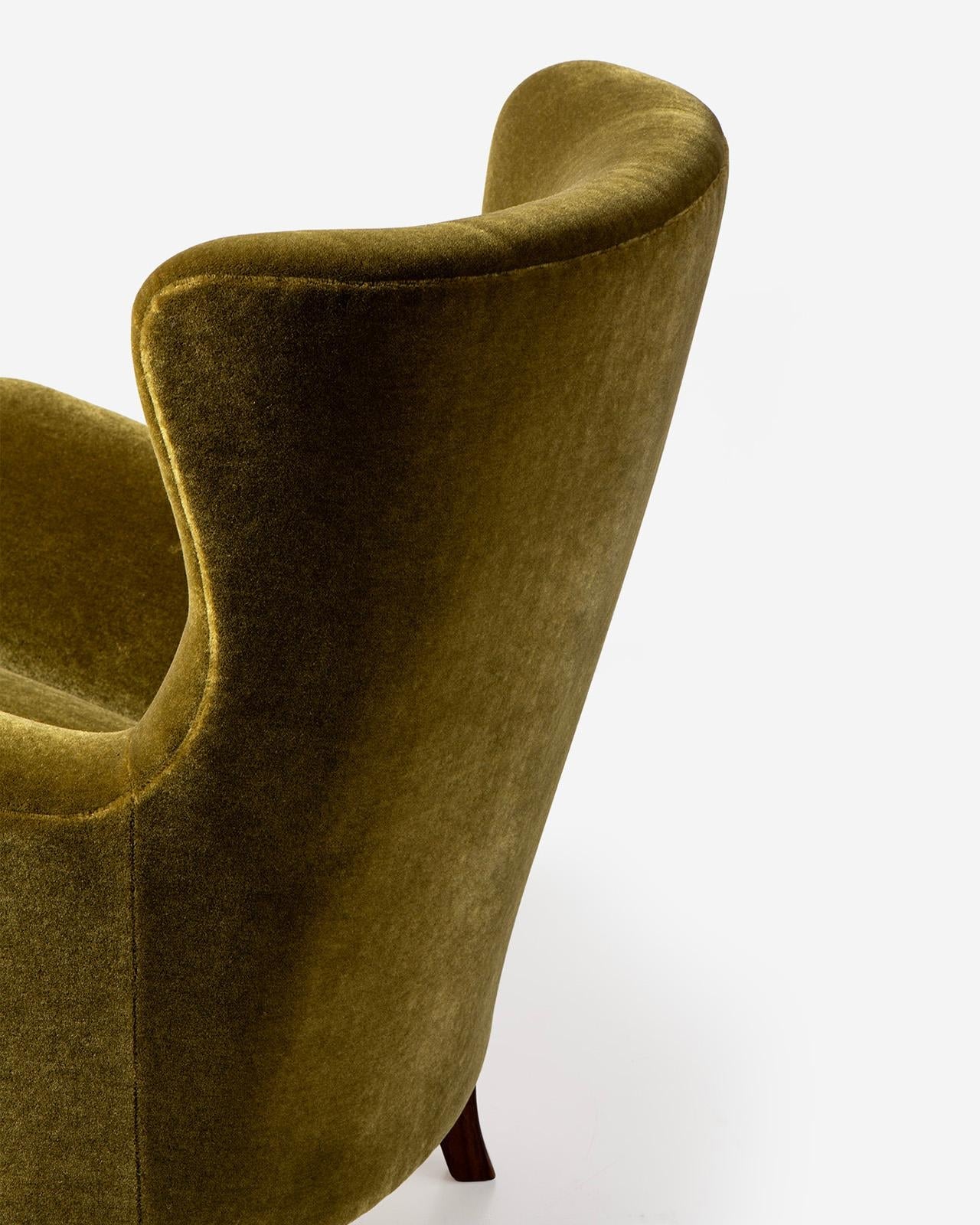 https://a.1stdibscdn.com/mohair-velvet-sampo-wing-chair-from-dagmar-for-sale-picture-7/f_13332/f_485414921769547464614/Christien_Sorensen_Sampo_Chair_PF_Bold_Army_Walnut_Detail_3_1600_master.jpg