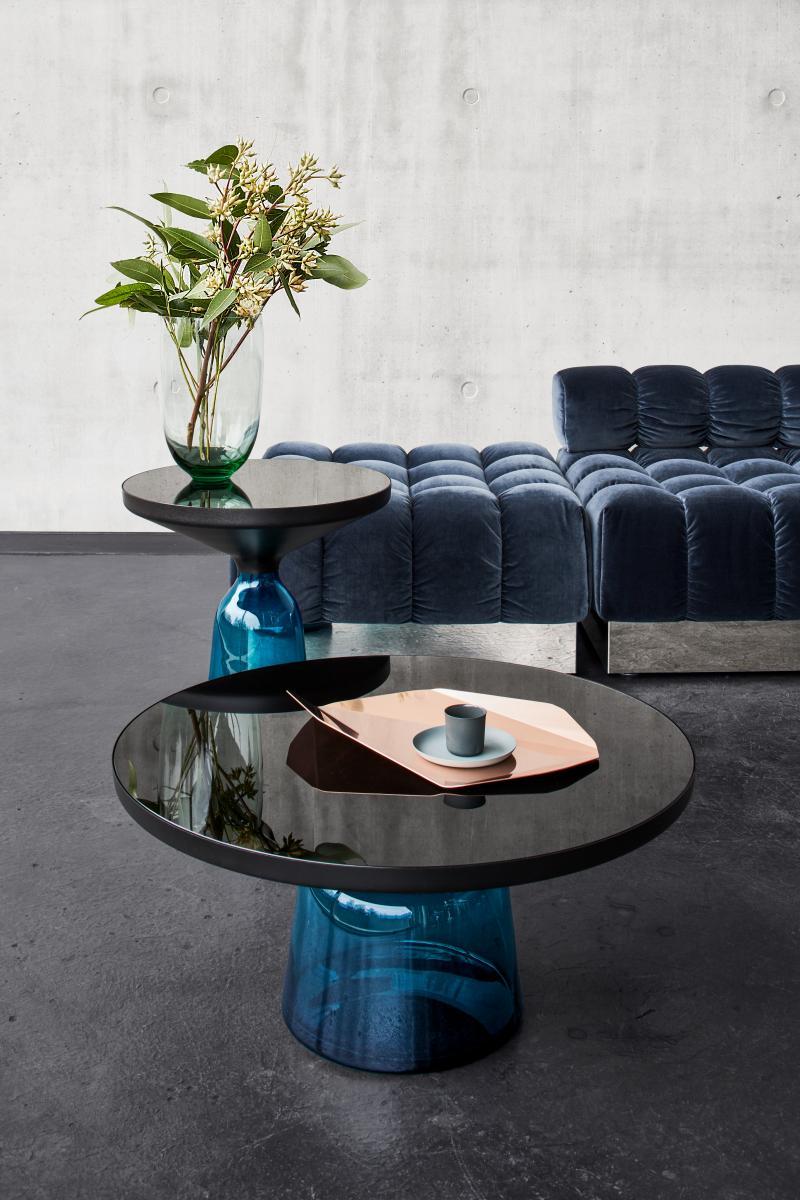 https://a.1stdibscdn.com/classicon-bell-coffee-table-by-sebastian-herkner-montana-blue-glass-black-for-sale-picture-3/f_105752/f_491554621773138509546/ClassiCon_bell_table_shia_vase_piega_tray_vt_photo_hassos_master.jpg