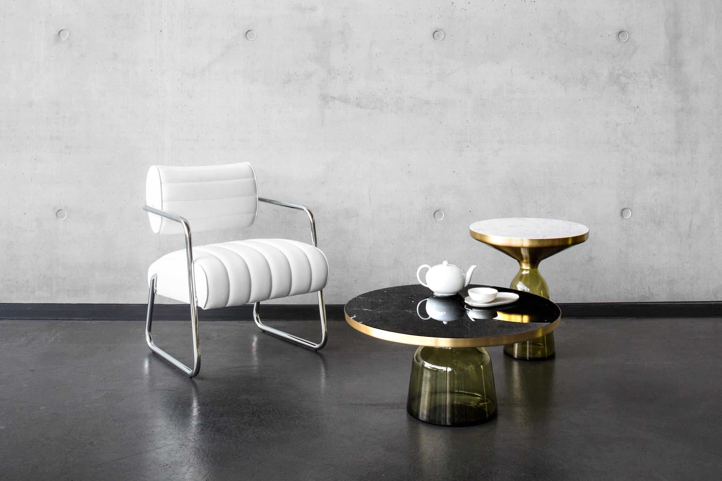 https://a.1stdibscdn.com/classicon-bonaparte-chair-in-white-leather-by-eileen-gray-for-sale-picture-2/12330573/f_138499411551428607009/ClassiCon_bonaparte_armchair_bell_table_marble_photo_hassos_8__master.jpg