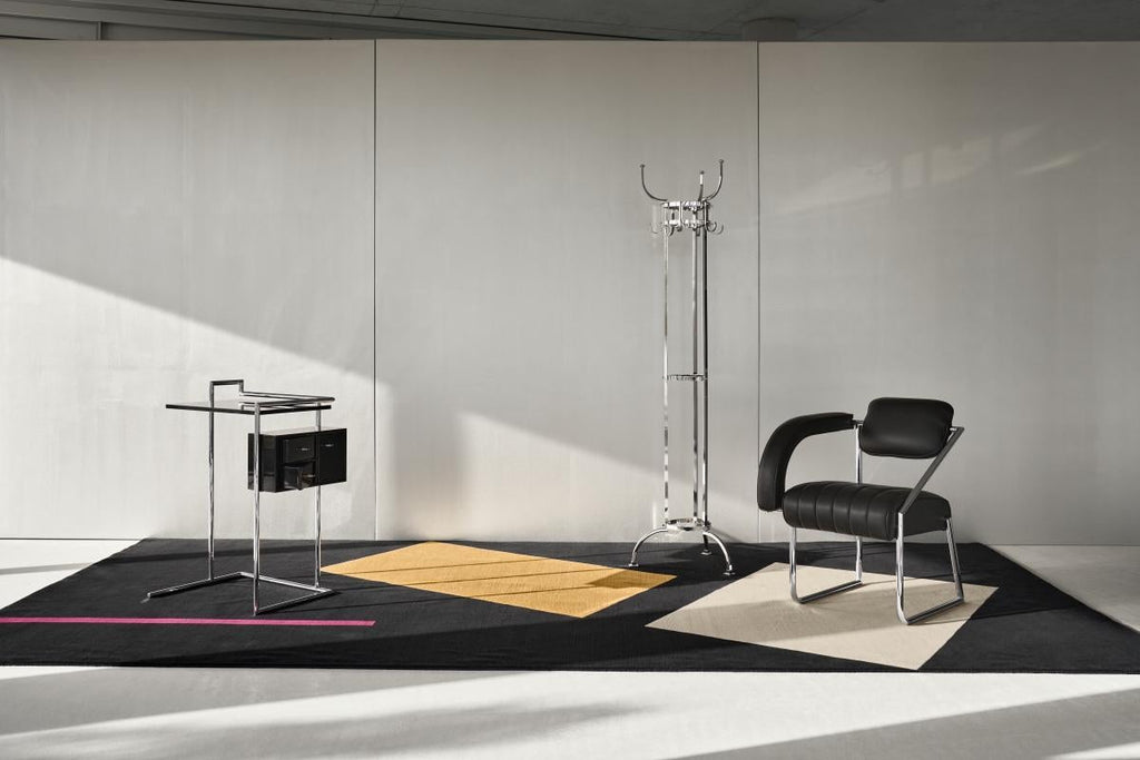 https://a.1stdibscdn.com/armchair-in-leather-black-classicon-non-conformist-armchair-design-eileen-gray-for-sale-picture-4/f_105752/f_487287121770657660730/ClassiCon_bonaparte_rug_petite_coiffeuse_nymphenburg_coat_stand_non_conformist_armchair_photo_hassos_master.jpg