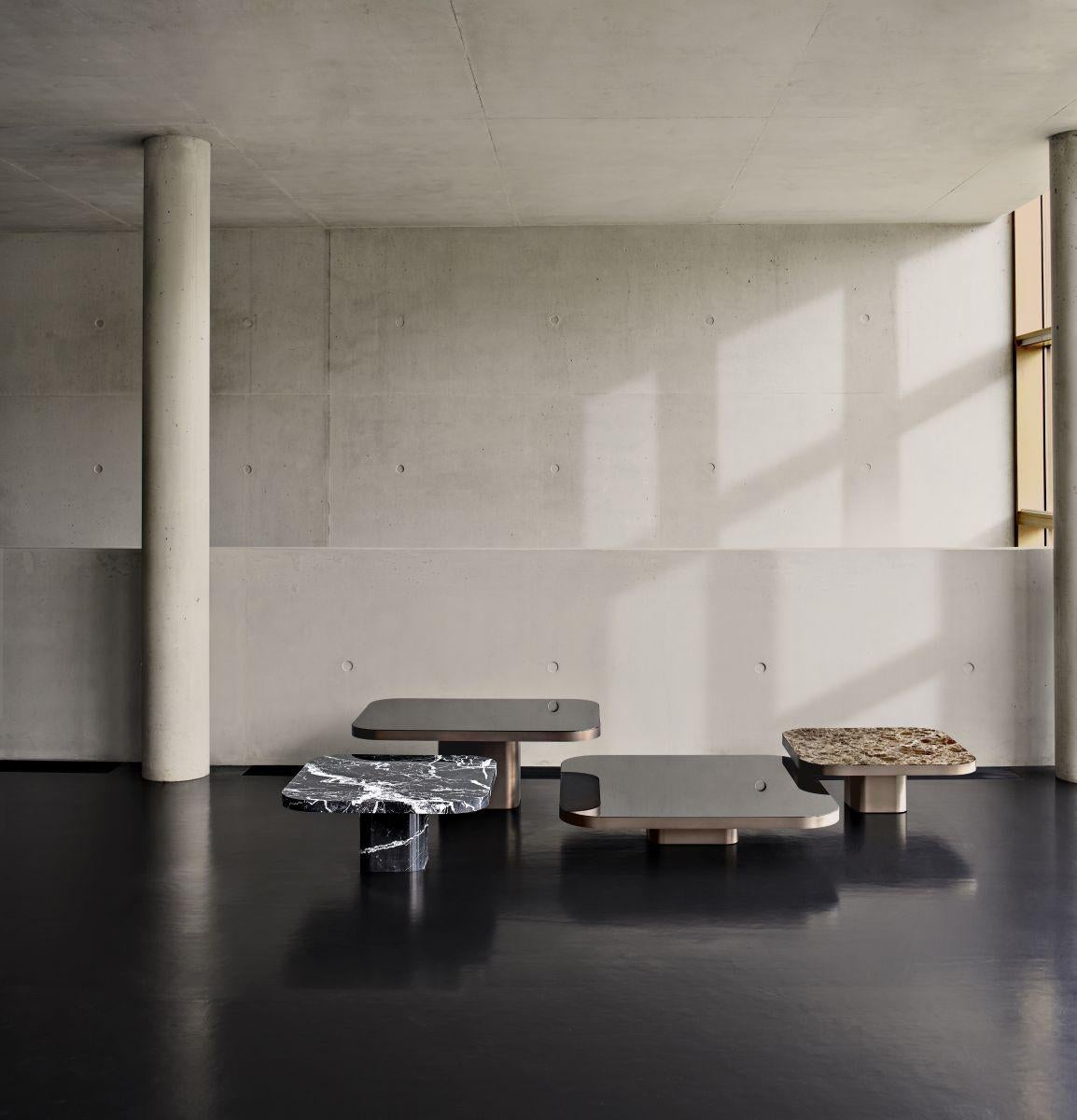 https://a.1stdibscdn.com/classicon-bow-coffee-table-no-6-by-guilherme-torres-for-sale-picture-8/f_44632/f_376444821703010818933/ClassiCon_bow_coffee_table_no3_marble_nero_marquina_no6_no4_no2_marble_emperador_dark_photo_hassos_master.jpg