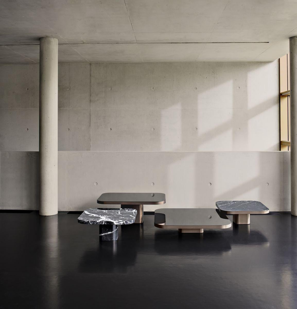 https://a.1stdibscdn.com/classicon-bow-coffee-table-no-6-by-guilherme-torres-for-sale-picture-6/f_44632/f_376444821703010818847/ClassiCon_bow_coffee_table_no3_marble_nero_marquina_no6_no4_no2_marble_nero_marquina_photo_hassos_master.jpg
