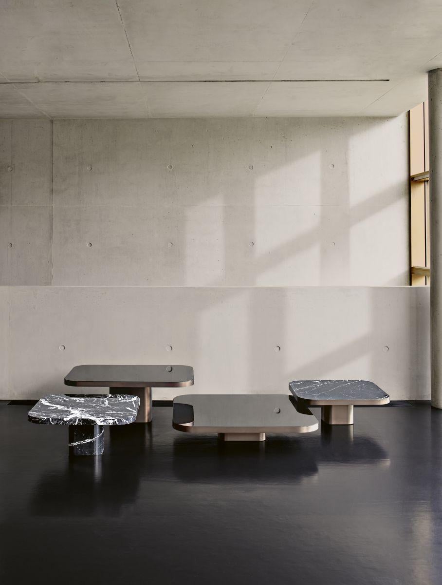 https://a.1stdibscdn.com/classicon-bow-coffee-table-no-6-by-guilherme-torres-for-sale-picture-7/f_44632/f_376444821703010818835/ClassiCon_bow_coffee_table_no3_marble_nero_marquina_no6_no4_no2_marble_nero_marquina_vt_photo_hassos_master.jpg