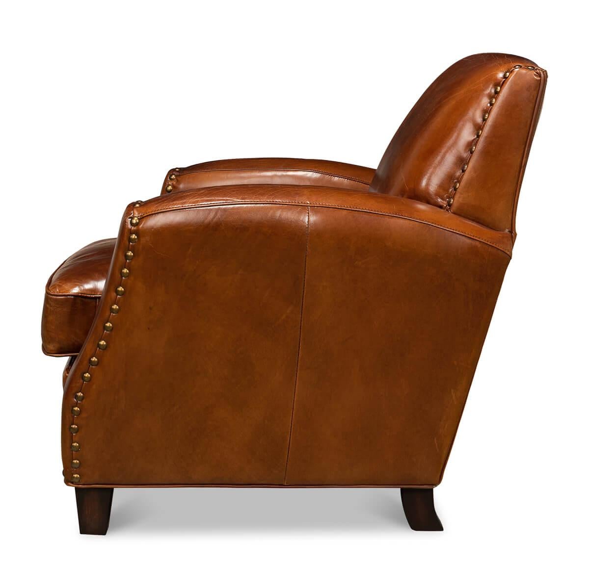 https://a.1stdibscdn.com/classic-leather-armchair-for-sale-picture-3/f_8038/f_281312921649286786077/Classic_Leather_Armchair_2_master.jpg