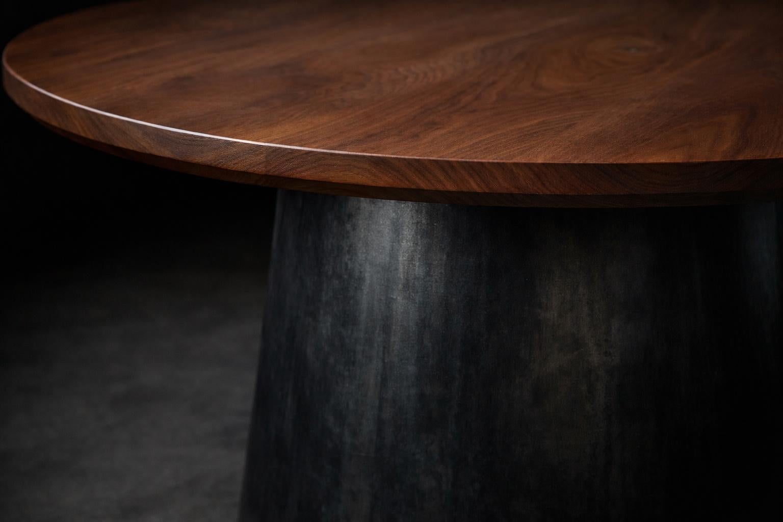https://a.1stdibscdn.com/round-black-walnut-dining-table-sculptural-steel-base-custom-sizes-for-sale-picture-5/f_77532/f_468642921776319864311/Closeup_contrast_Alexandra_Walnut_table_master.jpg
