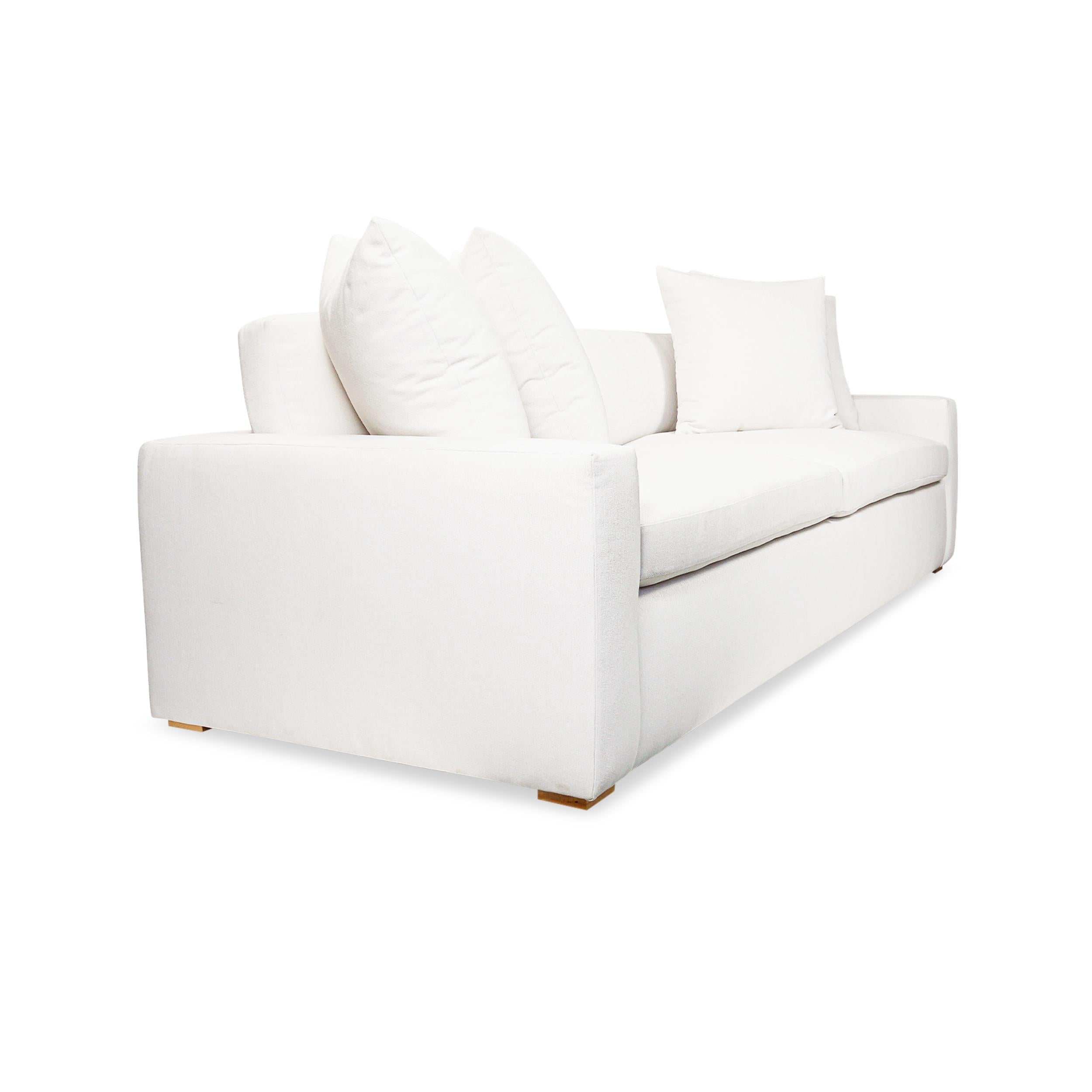 https://a.1stdibscdn.com/custom-deep-seat-sofa-with-down-cushions-and-low-profile-frame-for-sale-picture-3/f_21233/f_484373421769027863499/Cloud_White_Fabric_Sofa_Angle_master.jpg