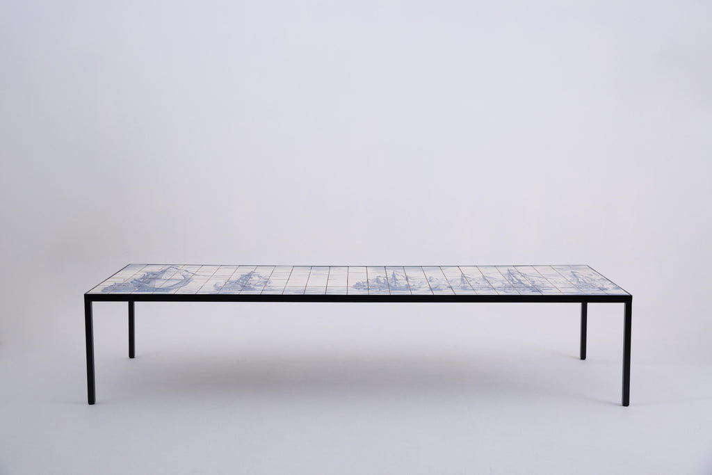 https://a.1stdibscdn.com/mesa-portuguesa-com-certeza-by-marcio-kogan-hand-painted-tile-metal-table-for-sale-picture-2/f_104502/f_451537321748008049529/Co_pia_de_55_30OUT2020_276_master.jpg