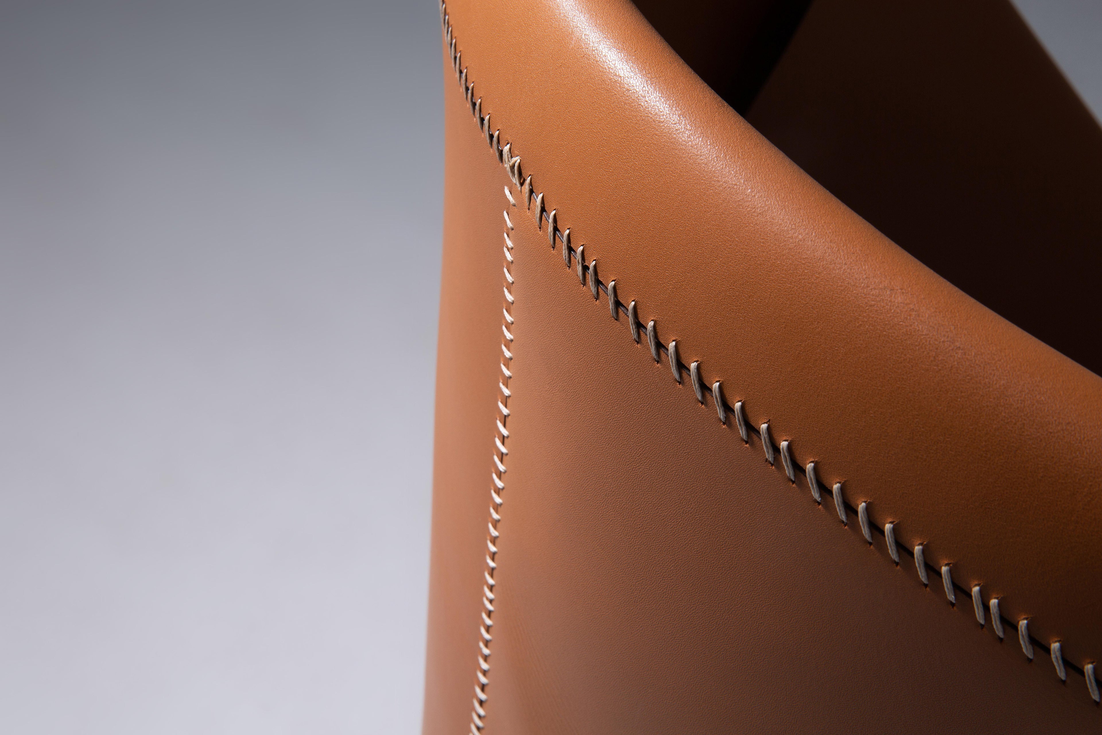 https://a.1stdibscdn.com/ilse-lang-molded-leather-dining-chair-sculptural-comfort-timeless-craft-for-sale-picture-2/f_104502/f_451864721748261294743/Co_pia_de_ILSE_LANG_2245_master.jpg