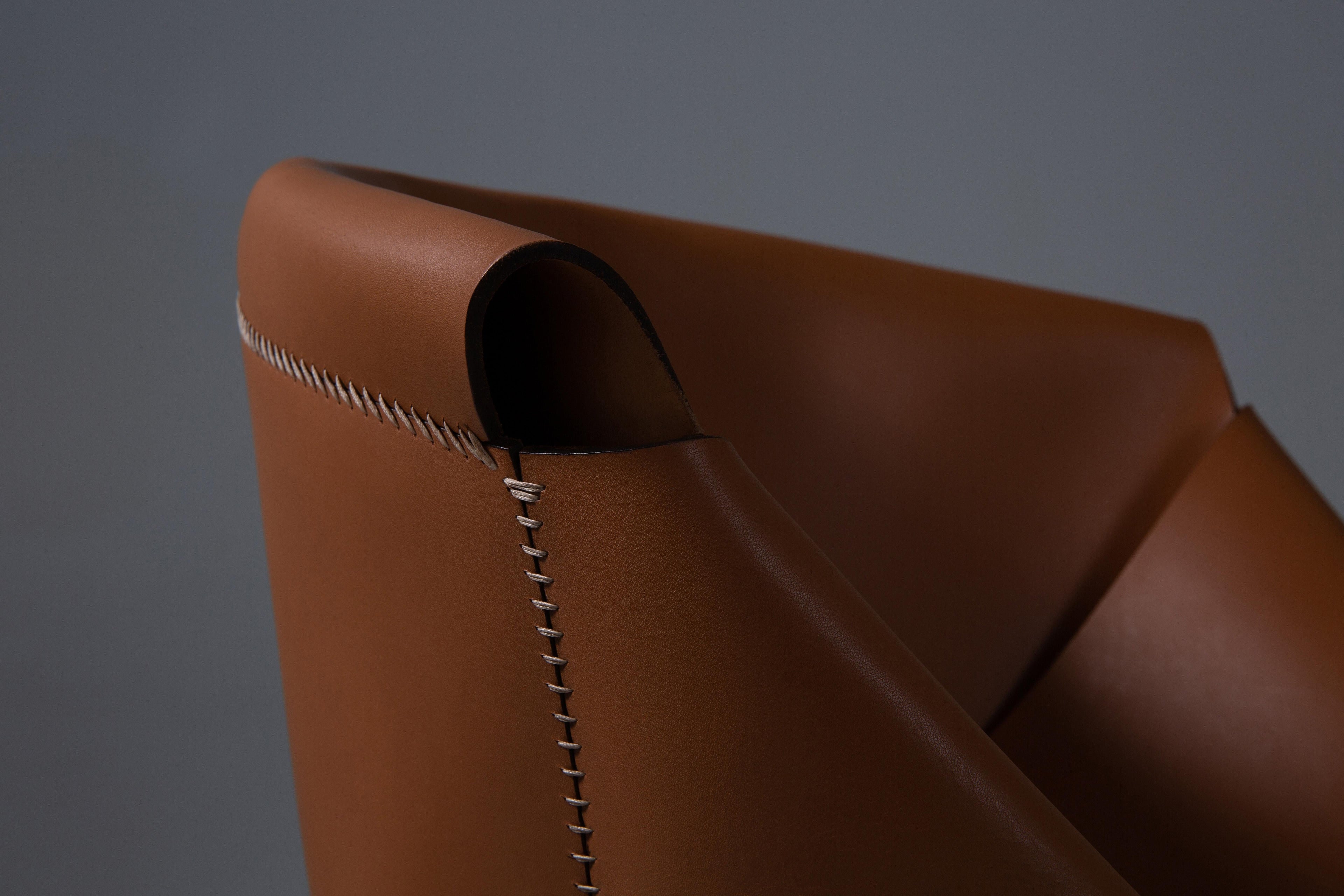 https://a.1stdibscdn.com/ilse-lang-molded-leather-dining-chair-sculptural-comfort-timeless-craft-for-sale-picture-3/f_104502/f_451864721748261294847/Co_pia_de_ILSE_LANG_2253_master.jpg