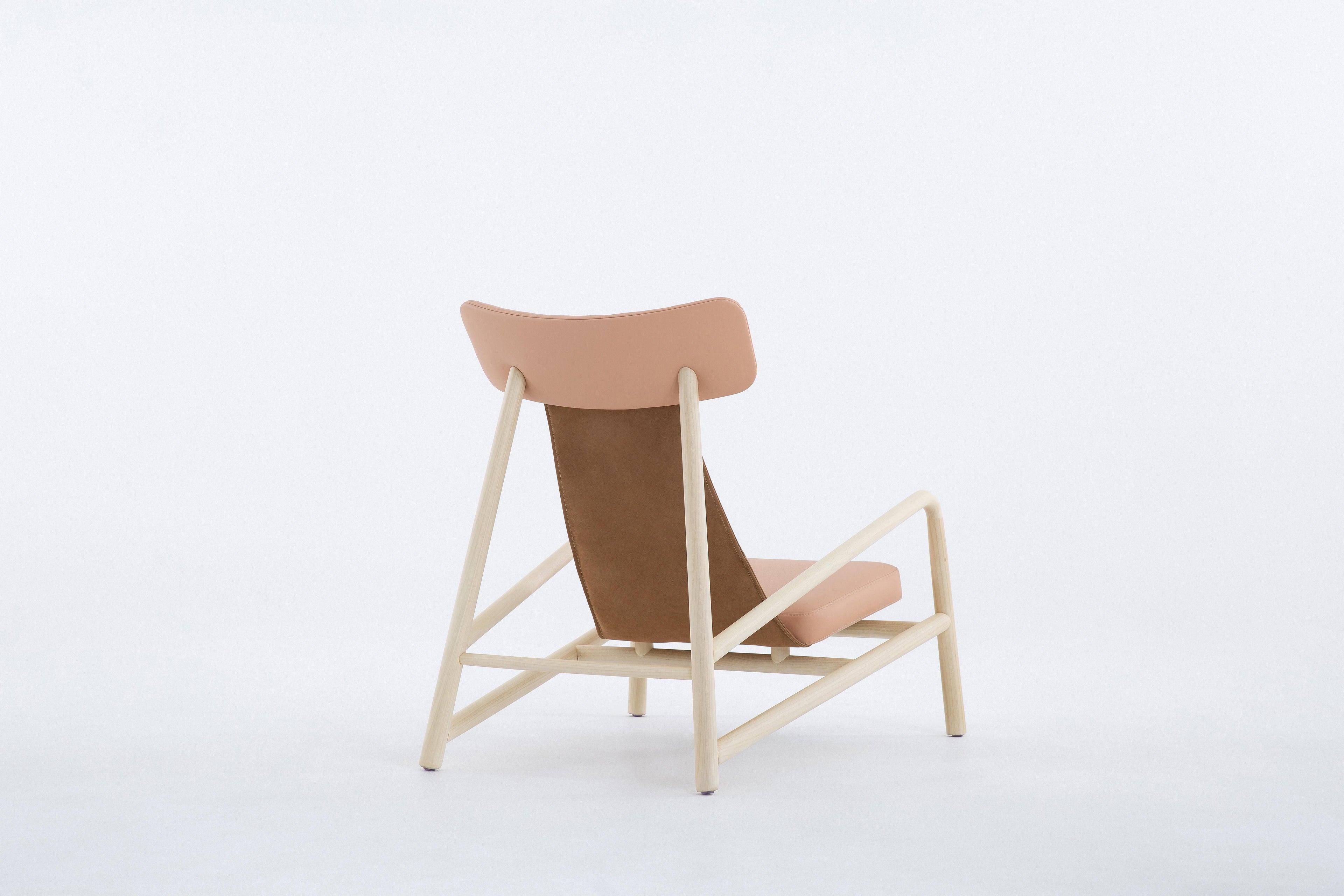 https://a.1stdibscdn.com/lounge-chair-with-stool-brazilian-hardwood-slender-frame-relaxed-seat-for-sale-picture-2/f_104502/f_459549121753091636785/Co_pia_de_ROBERTA_BANQUERI_1998_master.jpg