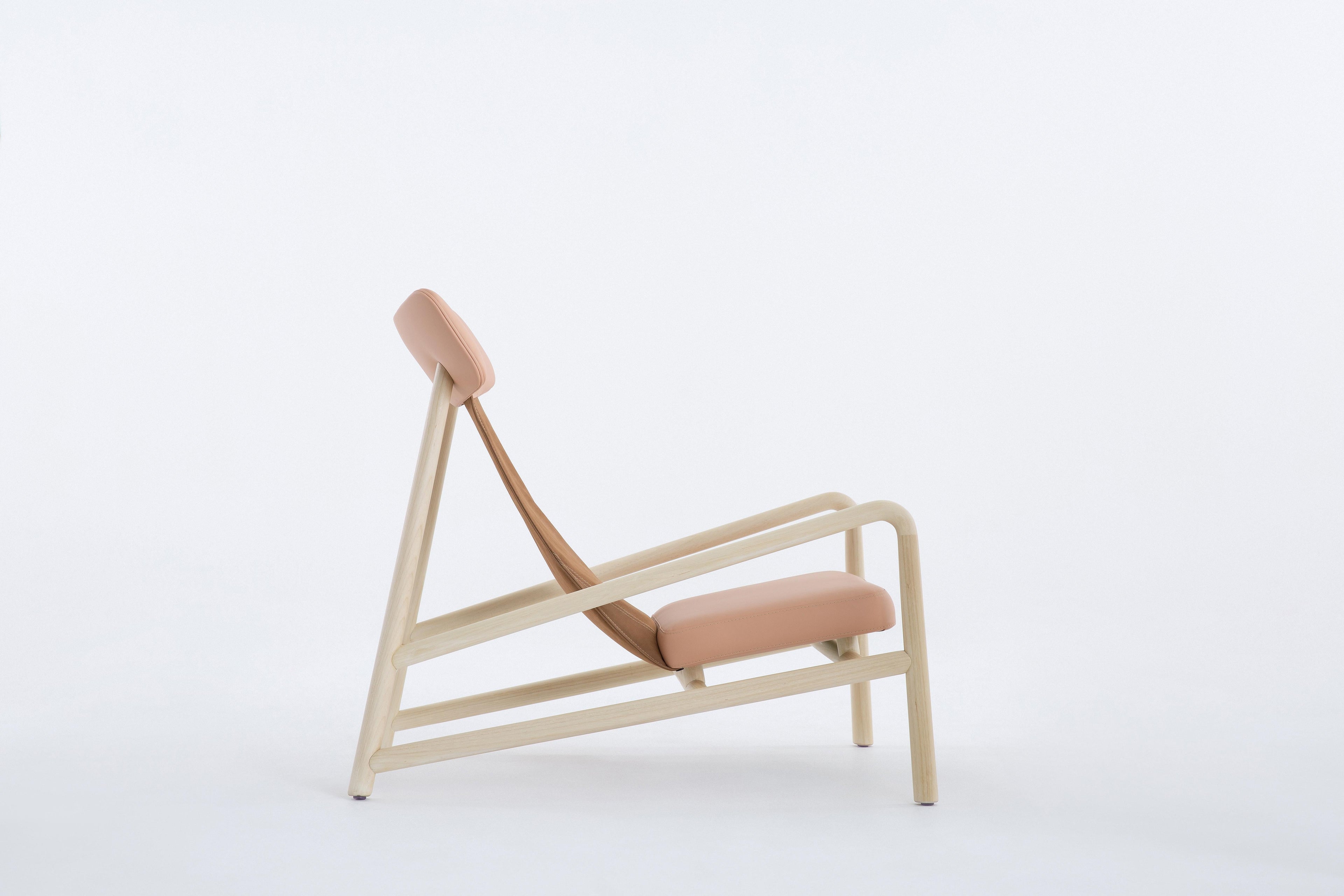 https://a.1stdibscdn.com/lounge-chair-with-stool-brazilian-hardwood-slender-frame-relaxed-seat-for-sale-picture-3/f_104502/f_459549121753091640577/Co_pia_de_ROBERTA_BANQUERI_1999_master.jpg