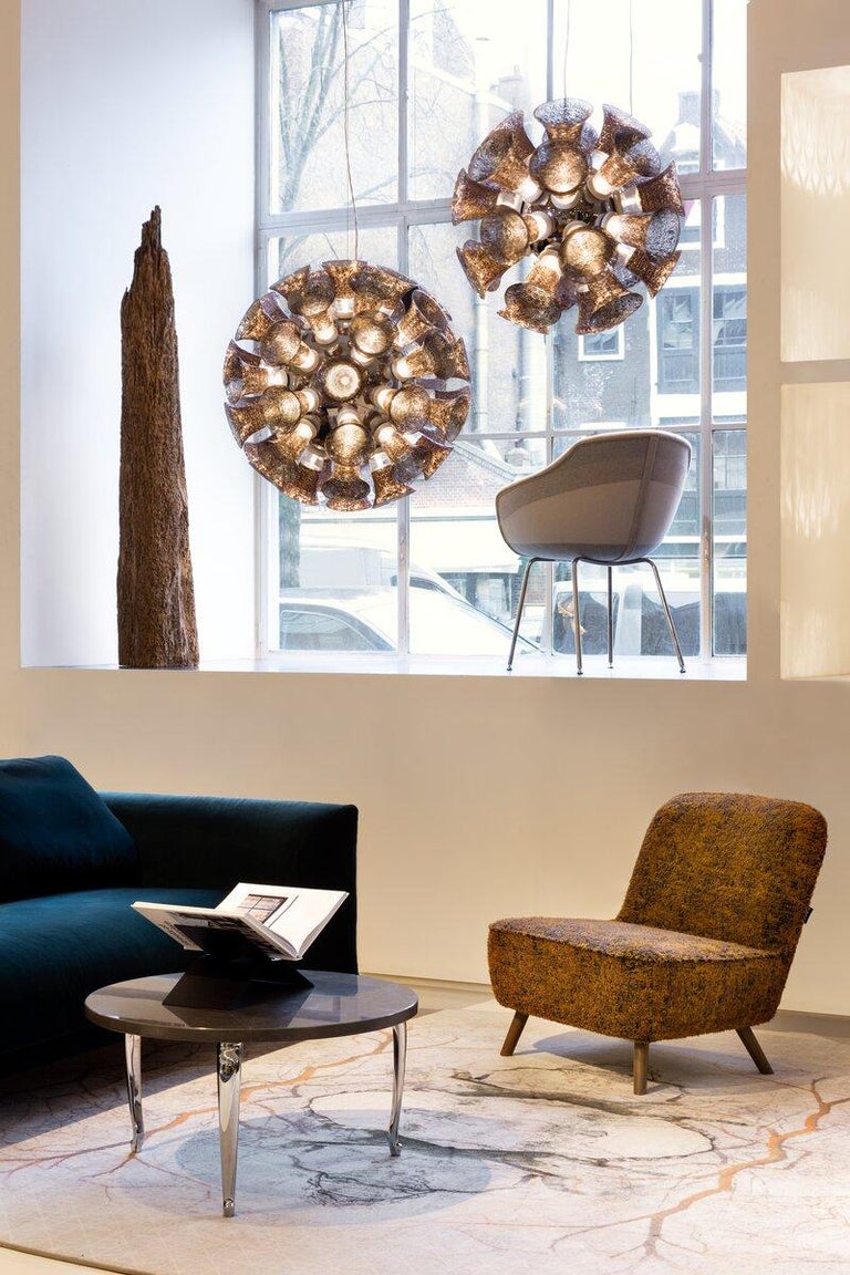 https://a.1stdibscdn.com/moooi-cocktail-chair-in-liscio-nebbia-upholstery-cinnamon-stained-legs-for-sale-picture-9/22569652/f_271086121643352025761/Cocktail_Chair_7_6__master.jpg?width=768