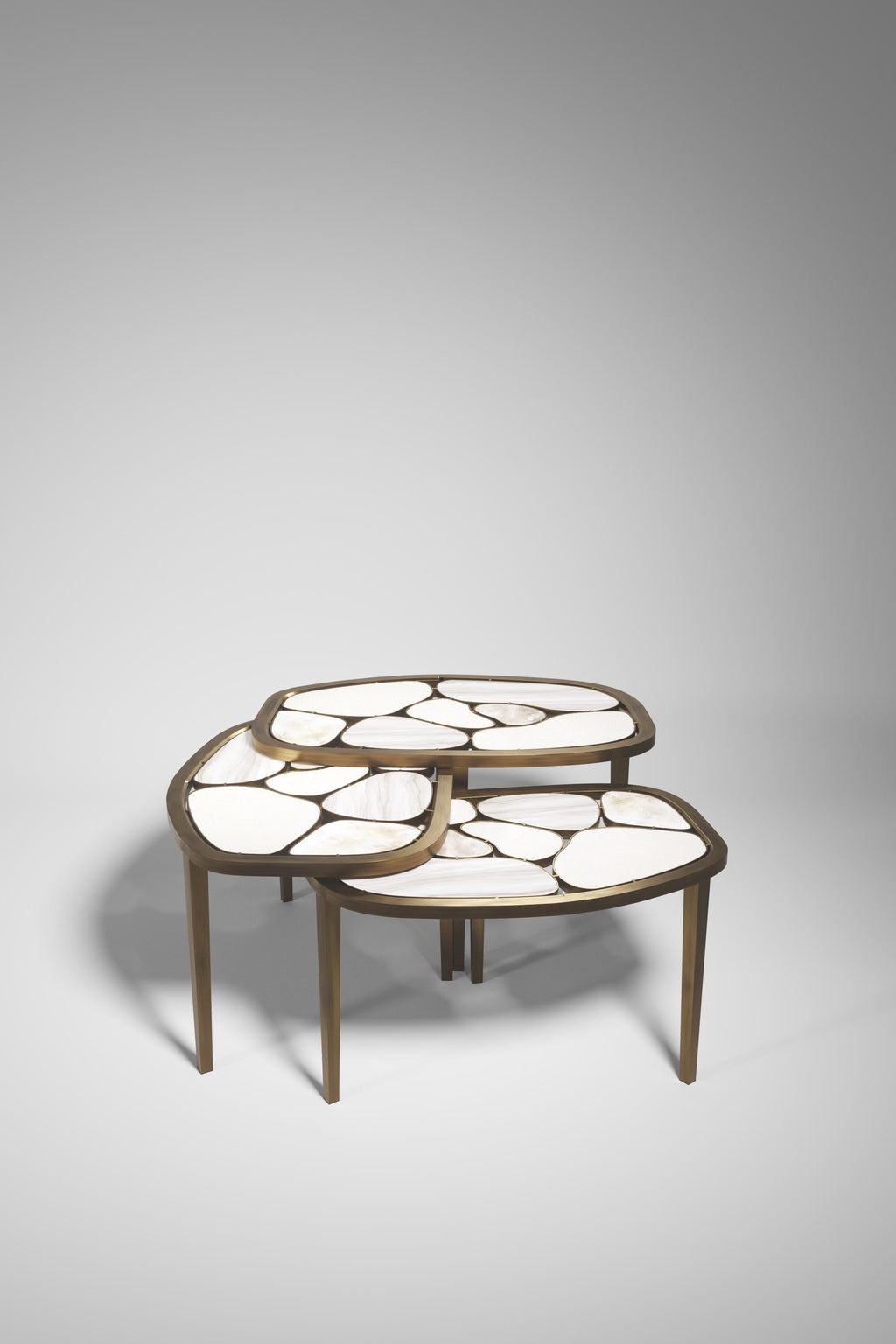 https://a.1stdibscdn.com/shagreen-and-quartz-nesting-coffee-table-with-brass-details-by-kifu-paris-for-sale-picture-5/f_45491/f_468420621759058491853/Coffee_Tables_Nesting_D1_STN10_STN90000_master.jpg